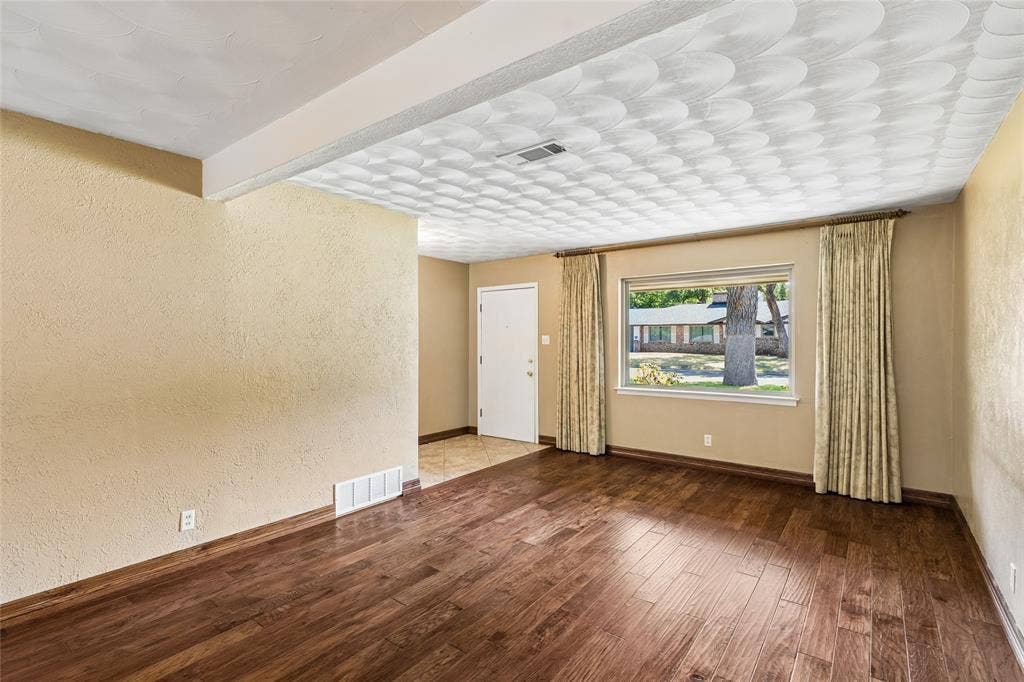 505 Caduceus Lane, Hurst, TX 76053 Warm rich real wood floors greet you as you enter this well built home