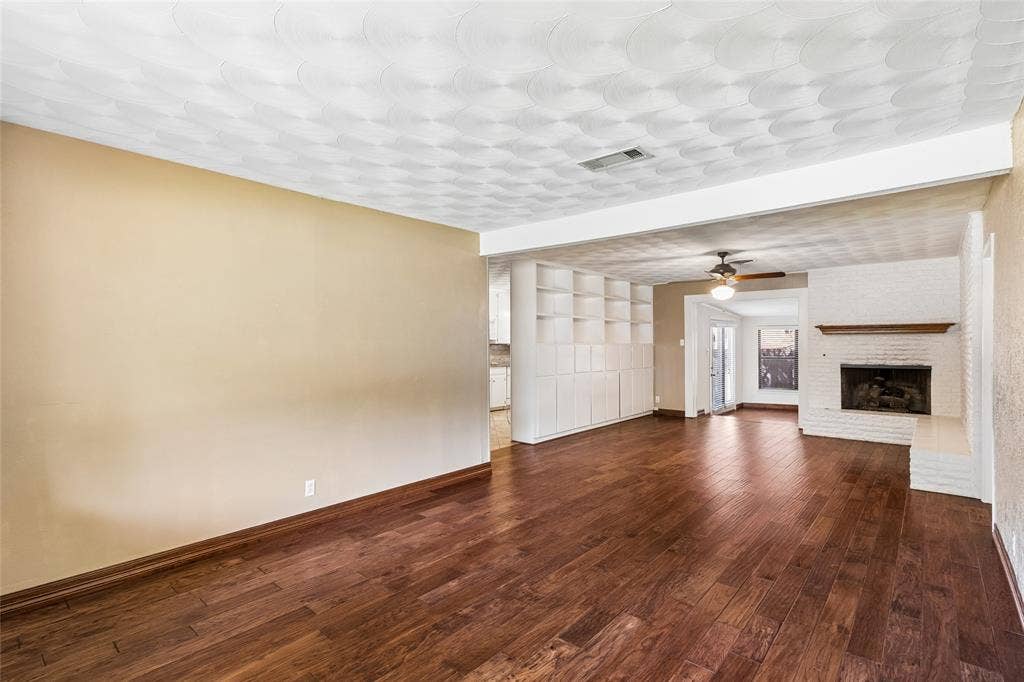 505 Caduceus Lane, Hurst, TX 76053 Corner gas logs fireplace provides a great centerpiece for conversations