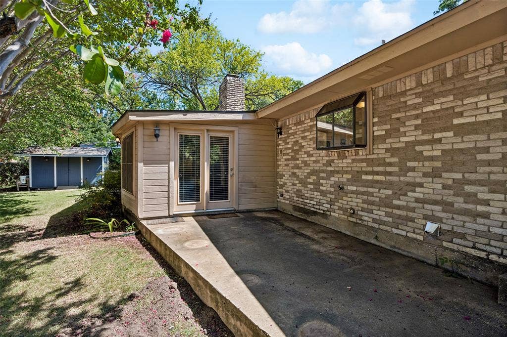 505 Caduceus Lane, Hurst, TX 76053 Open patio offers plenty of room for lawn furniture and two entrances into the home