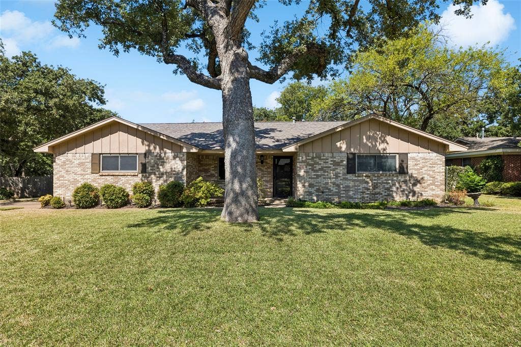 505 Caduceus Lane, Hurst, TX 76053 Beautiful trees surround front and back yards