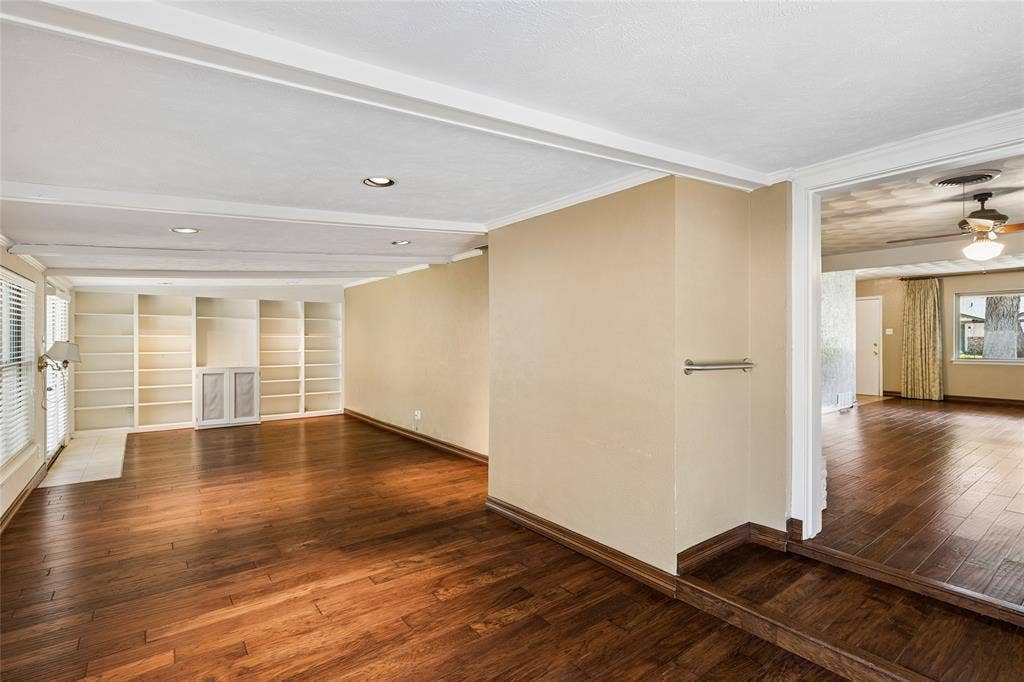 505 Caduceus Lane, Hurst, TX 76053 This perfect relaxation cove, the family room, has plenty of space for gatherings. Just imagine board game night, domino games with the neighbors, or a quiet reading room.