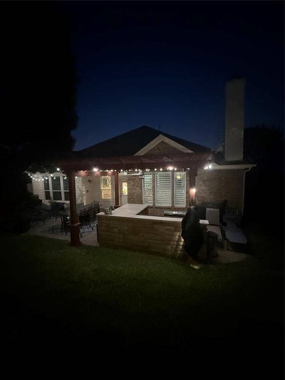 1759 Hidden Brook Drive, Grand Prairie, TX 75050 Evening picture to show upgraded lighting.