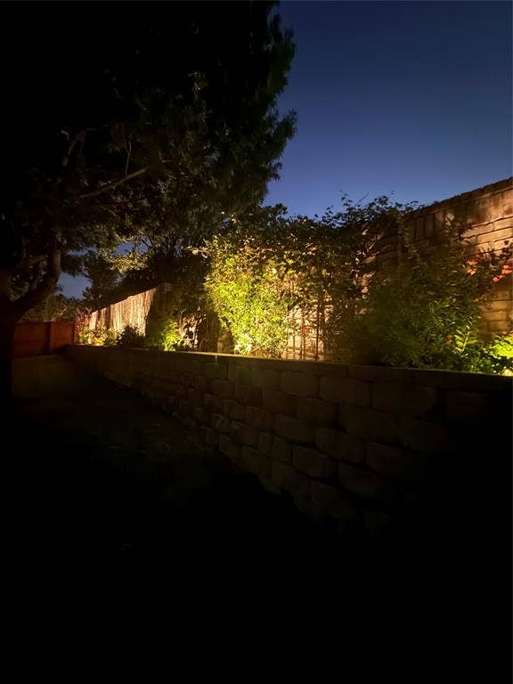 1759 Hidden Brook Drive, Grand Prairie, TX 75050 Evening picture to show landscape lighting.