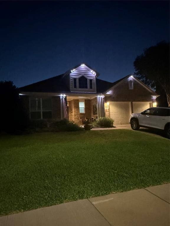 1759 Hidden Brook Drive, Grand Prairie, TX 75050 Evening picture to show upgraded lighting.