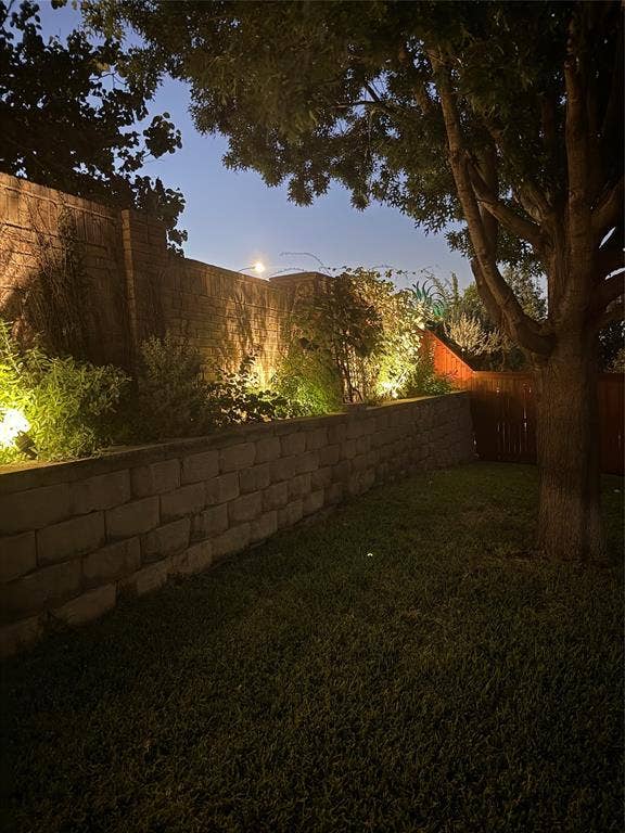 1759 Hidden Brook Drive, Grand Prairie, TX 75050 Evening picture to show landscape lighting.