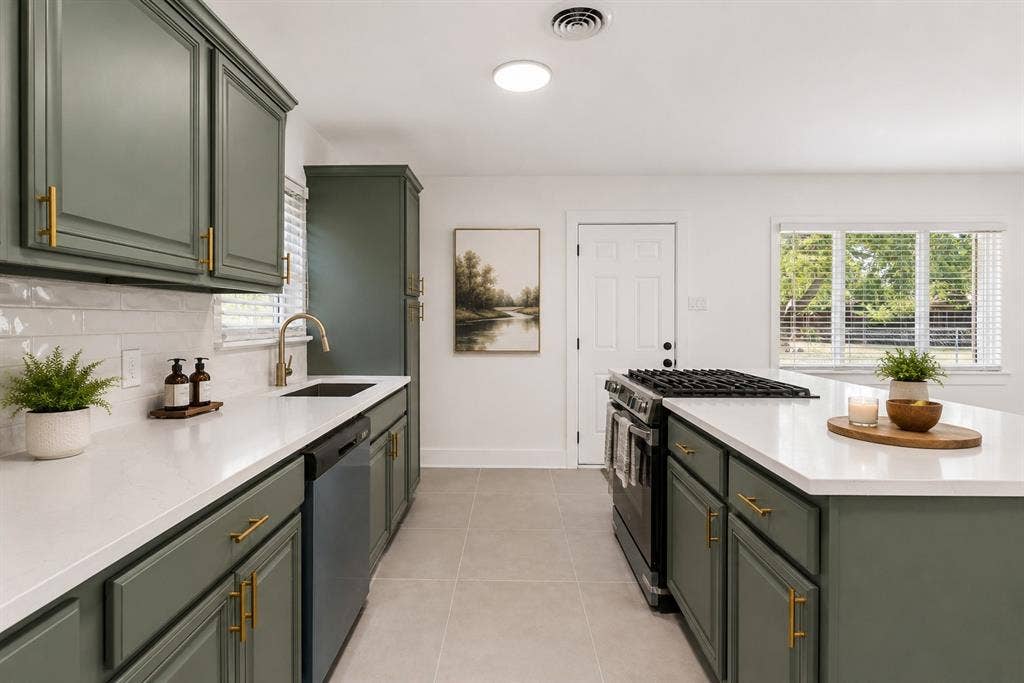2251 Hartline Drive, Dallas, TX 75228 Gourmet kitchen, sophisticated gold hardware, quartz countertops, undermount sink, brushed-gold faucet, modern subway title backsplash