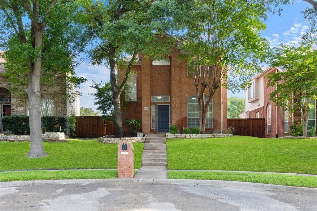 3221 Corning Drive, Plano, TX 75023 House is on curve of street, so the back yard is larger.