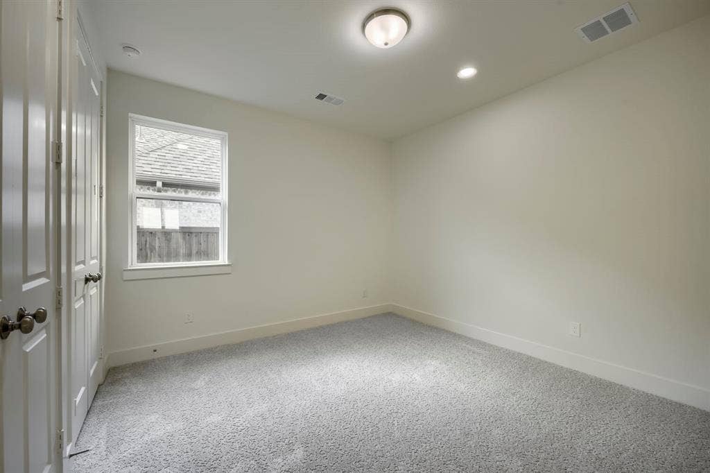 690 Red Cedar Road, Haslet, TX 76052 Light-filled room featuring carpet flooring, crisp white walls, and a recessed ceiling light