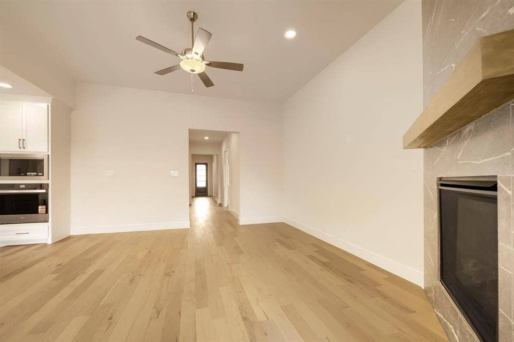 690 Red Cedar Road, Haslet, TX 76052 Vaulted ceiling with recessed lighting and a ceiling fan