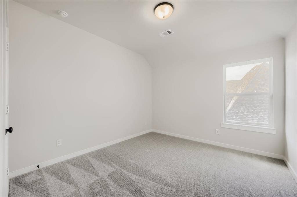 1281 White Pine Drive, Haslet, TX 76052 Neutral wall color, carpeted flooring, and a single window