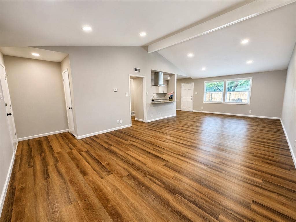 901 Melrose Drive, Richardson, TX 75080 Large dining and living area showing entry point