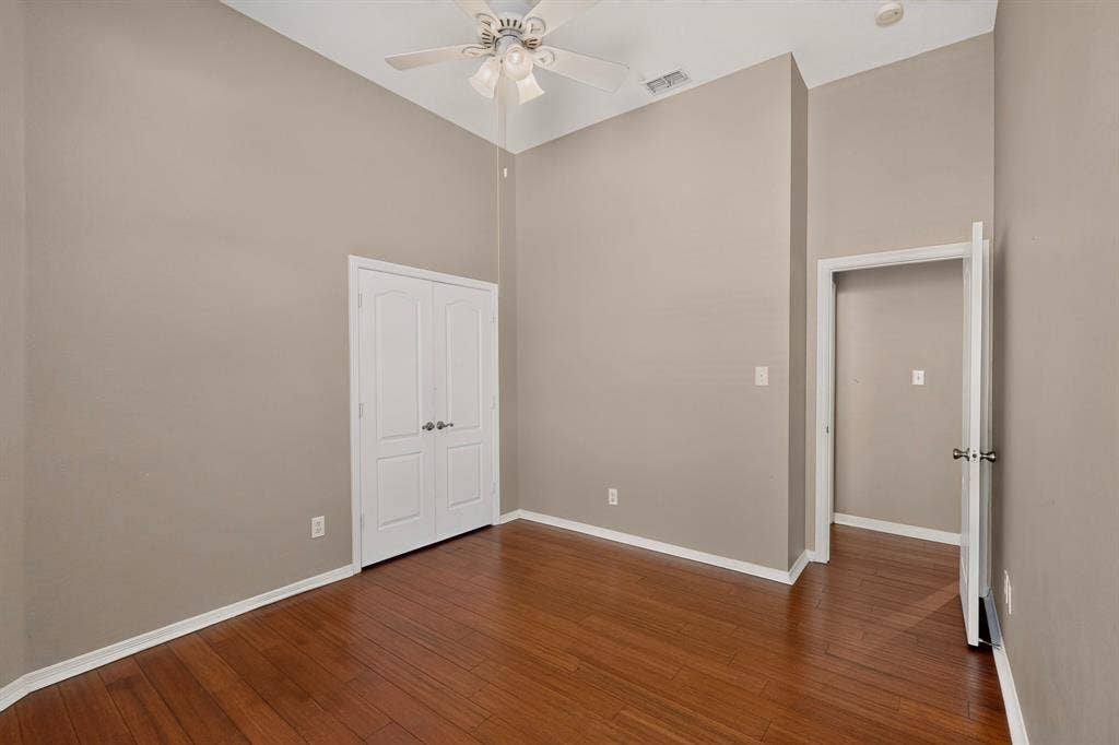 713 Mockingbird Court, Crowley, TX 76036 Vaulted ceilings, wood-finish flooring, ceiling fan, and double-panel doors