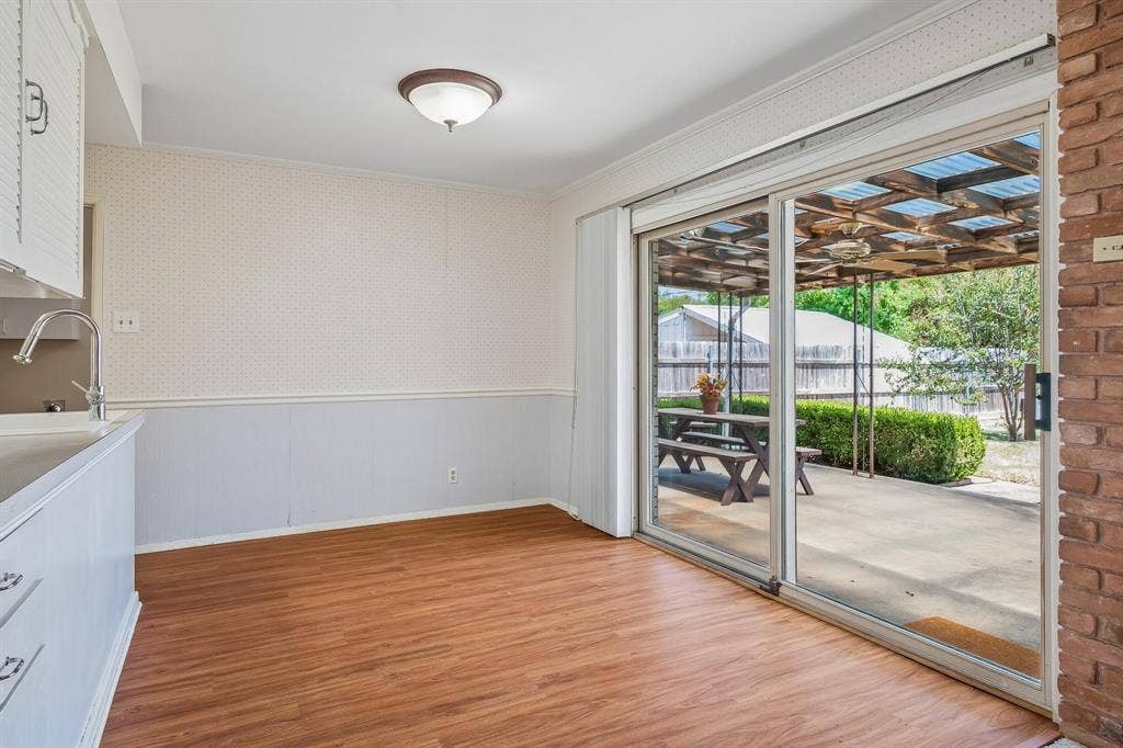 902 N Lindale Lane, Richardson, TX 75080 Dining area provides excellent views of the backyard.