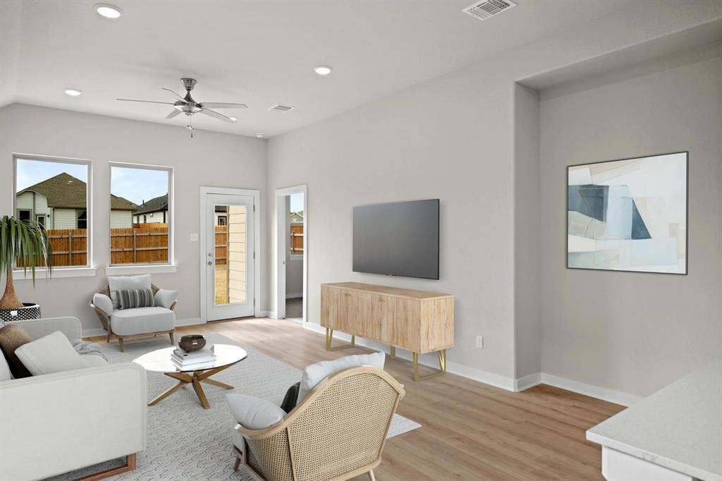 341 Millwood Road, Lavon, TX 75166 Living Room in the Birch home plan by Trophy Signature Homes – REPRESENTATIVE PHOTO