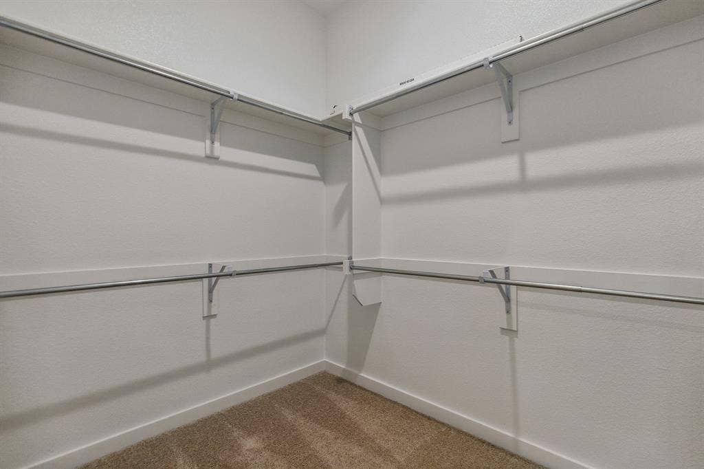 341 Millwood Road, Lavon, TX 75166 Primary Closet in the Birch home plan by Trophy Signature Homes – REPRESENTATIVE PHOTO