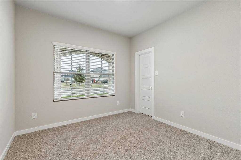 2214 Willowbank Drive, Forney, TX 75126 Bedroom in the Emmy II home plan by Trophy Signature Homes - REPRESENTATIVE PHOTO