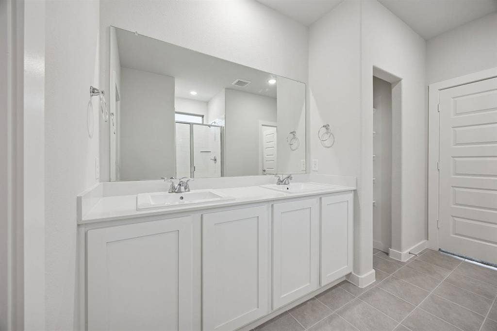 1336 Capecastle Lane, Forney, TX 75126 Primary Bathroom in the Oak II home plan by Trophy Signature Homes – REPRESENTATIVE PHOTO