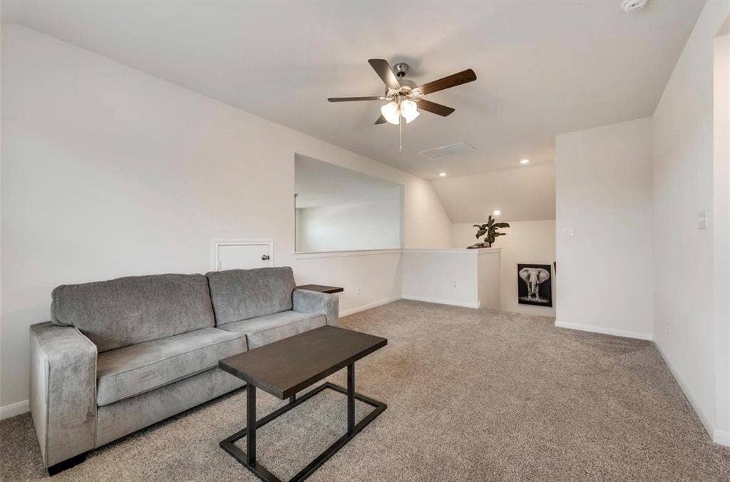 902 Western Way, Princeton, TX 75407 Versatile bonus room featuring soft carpeting, a ceiling fan with integrated lighting, and recessed lighting