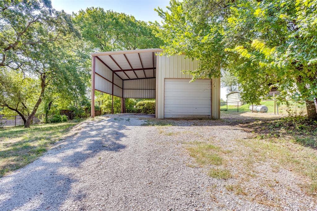 220 Royal Court, Weatherford, TX 76085 RV parking / 16x40 workshop with overhead and interior door