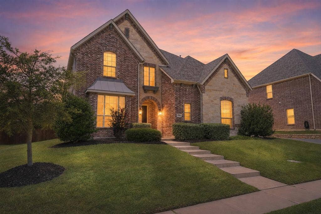 10846 Smoky Oak Trail, Argyle, TX 76226 This gorgeous almost 5,000 sqft home features a 3 car garage, a gorgeous brick and stone elevation, over a quarter acre lot that backs up to a quiet greenbelt for extra privacy, and the perfect layout with two of the five bedrooms on the first floor, as well as a dedicated office!
