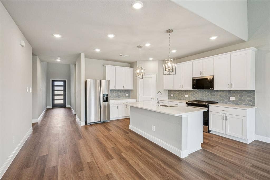 6202 Chickney Drive, Princeton, TX 75071 Photo is not of the actual home, but is an inspirational photo of builder’s model home and may depict options, furnishings, and/or decorator features that are not included.