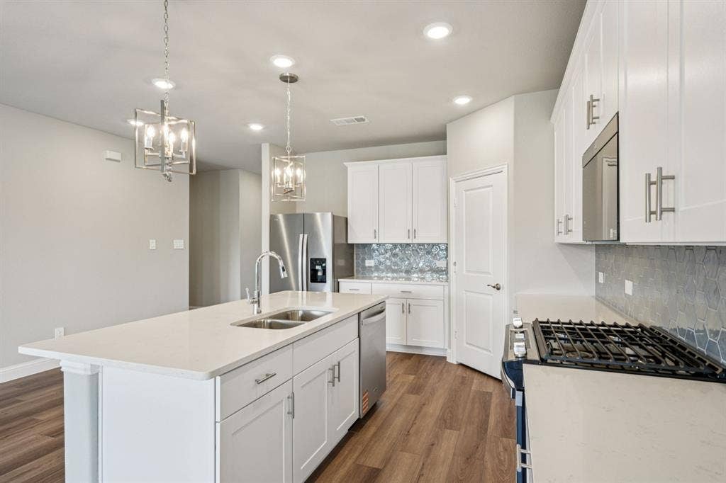 6202 Chickney Drive, Princeton, TX 75071 Photo is not of the actual home, but is an inspirational photo of builder’s model home and may depict options, furnishings, and/or decorator features that are not included.