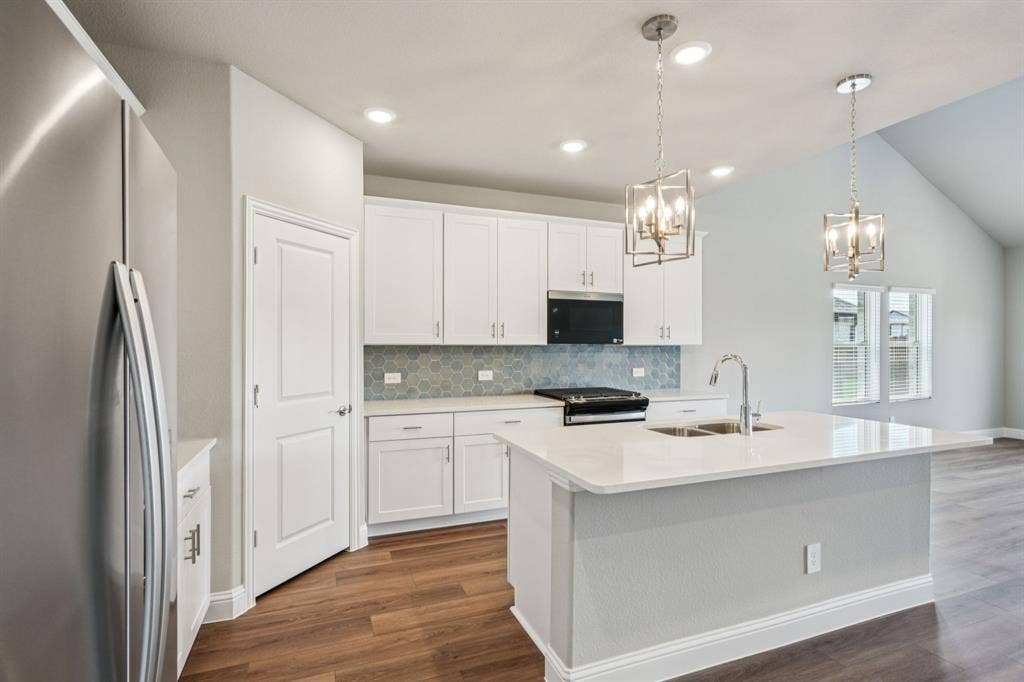 6202 Chickney Drive, Princeton, TX 75071 Photo is not of the actual home, but is an inspirational photo of builder’s model home and may depict options, furnishings, and/or decorator features that are not included.