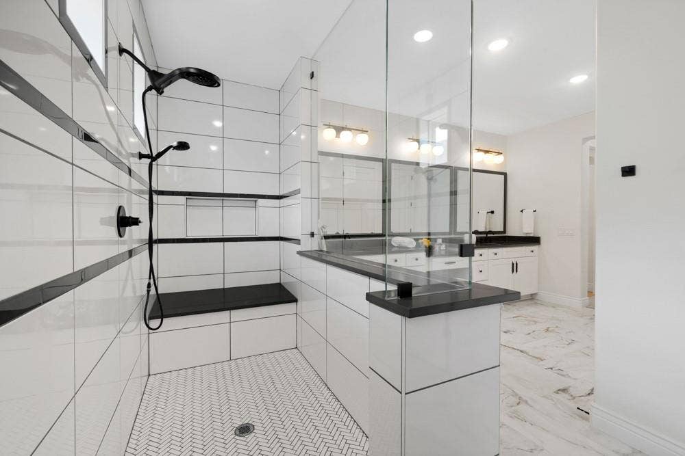 Two Heads in the nice sized Walk in Shower