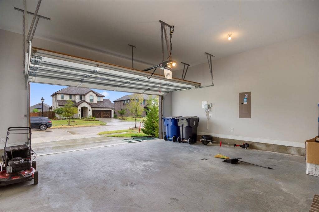 16050 Talamore Lane, Frisco, TX 75035 Garage featuring electric panel