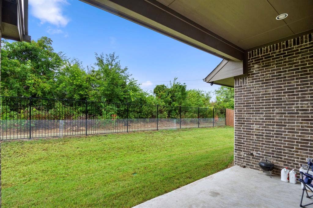 16050 Talamore Lane, Frisco, TX 75035 View of yard with a patio area