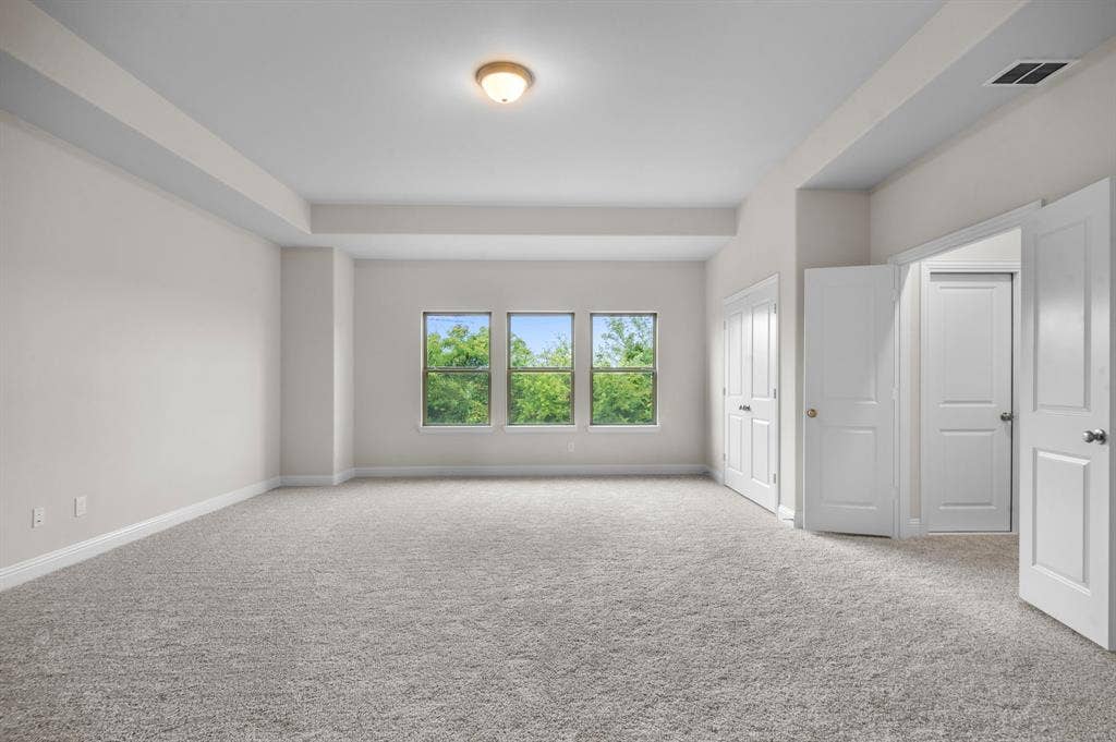 16050 Talamore Lane, Frisco, TX 75035 Unfurnished room featuring light carpet