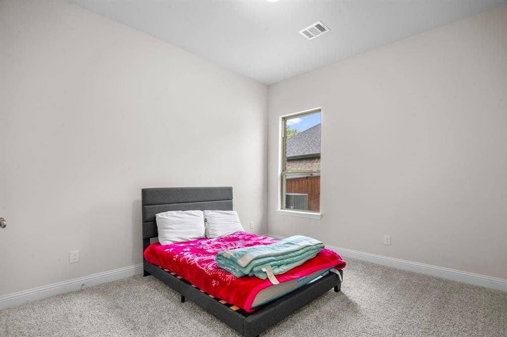 16050 Talamore Lane, Frisco, TX 75035 View of carpeted bedroom