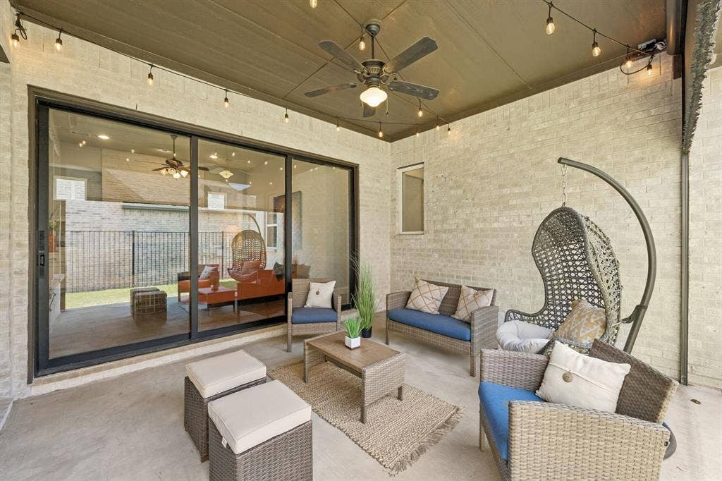 1107 Maverick Drive, Allen, TX 75013 Covered patio with sliding doors and retractable screen