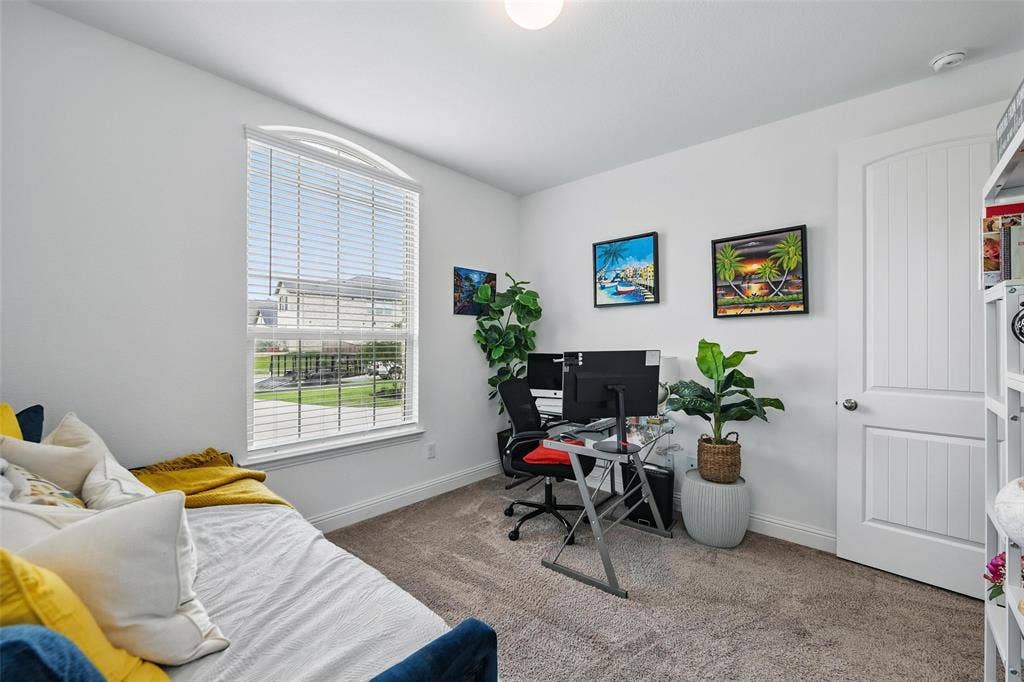 1477 Shooting Star Drive, Haslet, TX 76052 Downstairs bedroom with a walk-in closet