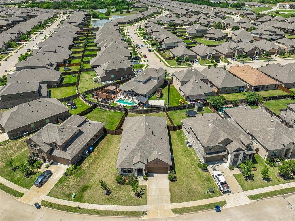 3106 Maverick Drive, Heath, TX 75126 Aerial view showcasing a residential neighborhood with a consistent architectural style