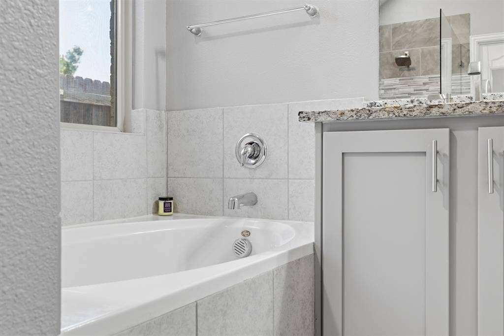 1556 Seminole Drive, Forney, TX 75126 Soaking tub in primary bathroom