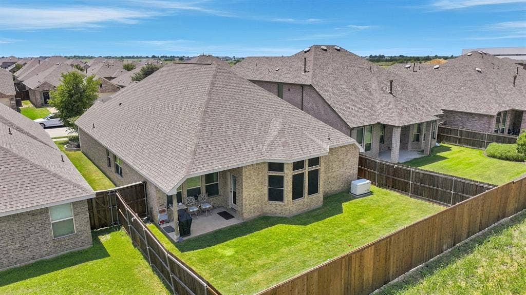 1556 Seminole Drive, Forney, TX 75126 Aerial view of the backyard and home