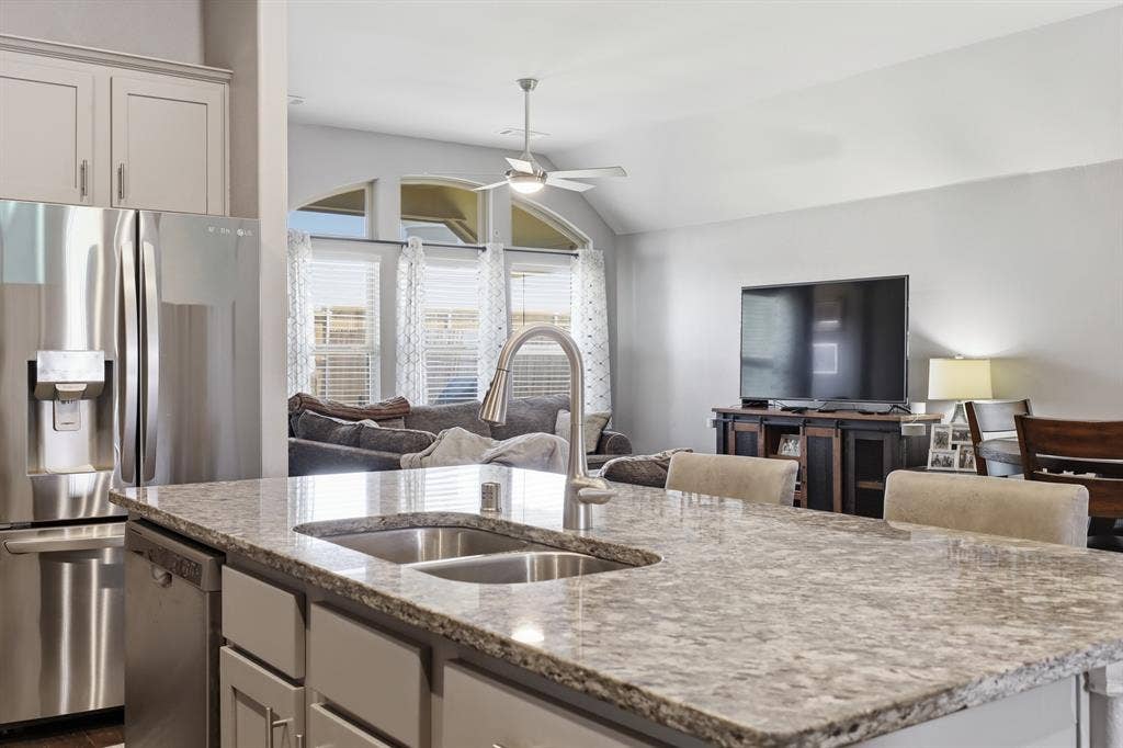 1556 Seminole Drive, Forney, TX 75126 Kitchen island with a double basin sink