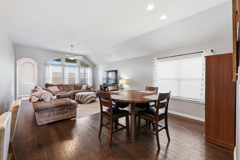 1556 Seminole Drive, Forney, TX 75126 Open-concept showcasing the dining room and living room