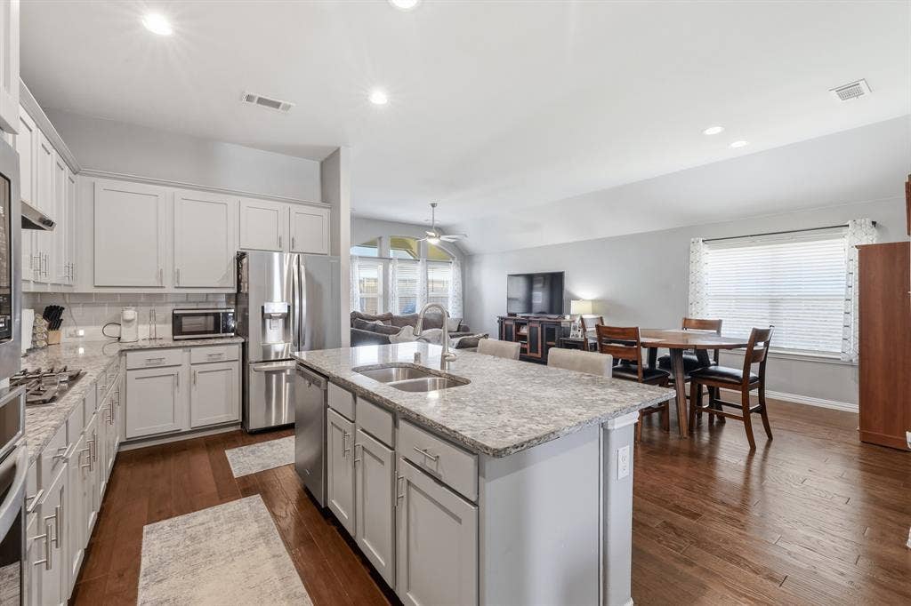 1556 Seminole Drive, Forney, TX 75126 Open Concept floor plan, kitchen overlooks the dining area and living room