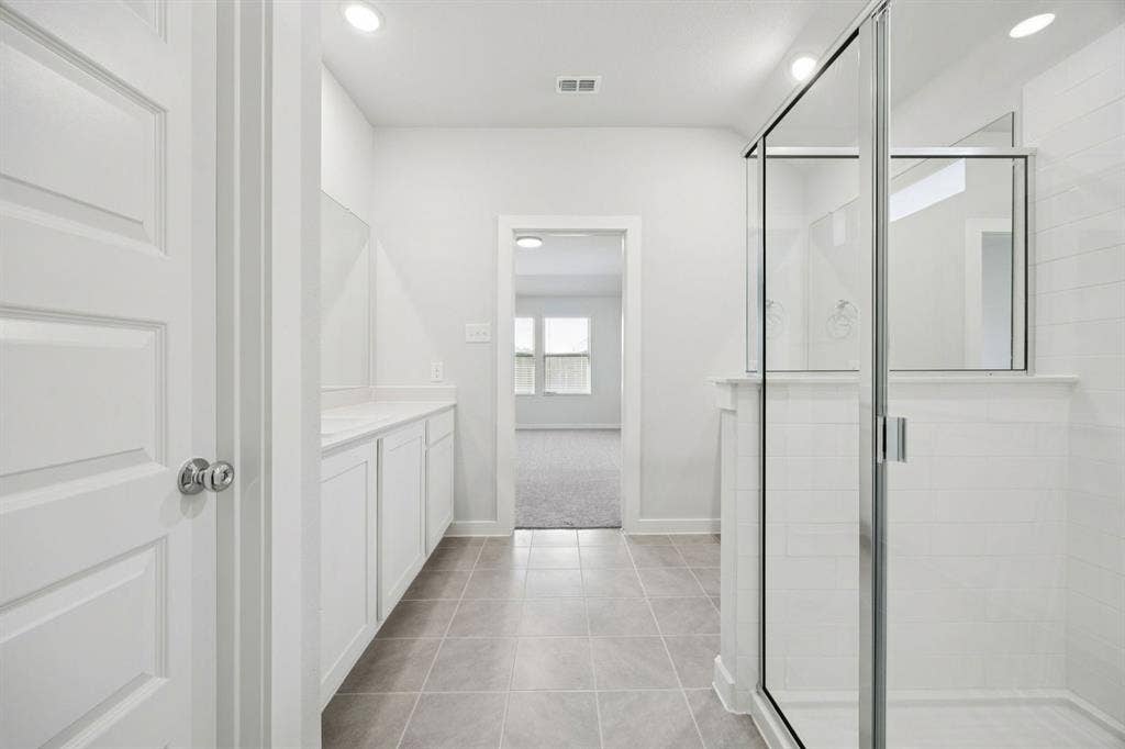 237 Bright Alcove Court, Lavon, TX 75166 Primary Bathroom in the Heisman home plan by Trophy Signature Homes – REPRESENTATIVE PHOTO