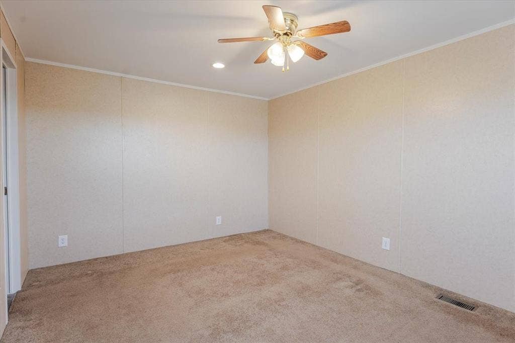 126 Starry Sky Court, Springtown, TX 76082 2nd bedroom offers, neutral carpet flooring and light-toned wall panels, with ceiling fan and walk in closet.