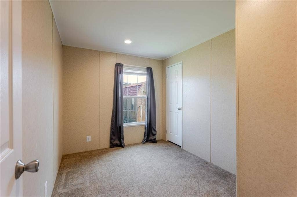126 Starry Sky Court, Springtown, TX 76082 3rd bedroom features carpet and walk in closet.