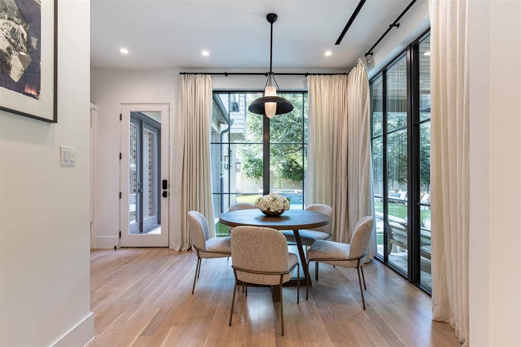 6979 Bob O Link Drive, Dallas, TX 75214 Dining area featuring light wood-finish flooring, recessed lighting, and a modern pendant fixture