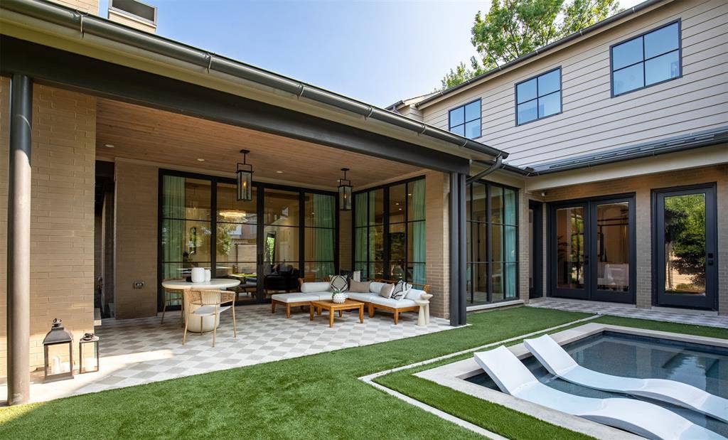 6979 Bob O Link Drive, Dallas, TX 75214 Covered patio with a patterned tile surface, recessed lighting, and wall-mounted lanterns