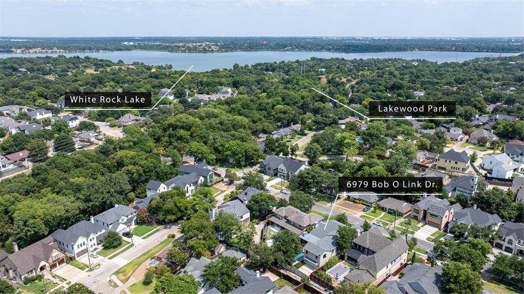 6979 Bob O Link Drive, Dallas, TX 75214 Aerial perspective showcasing a residential neighborhood with mature trees and varied architectural styles