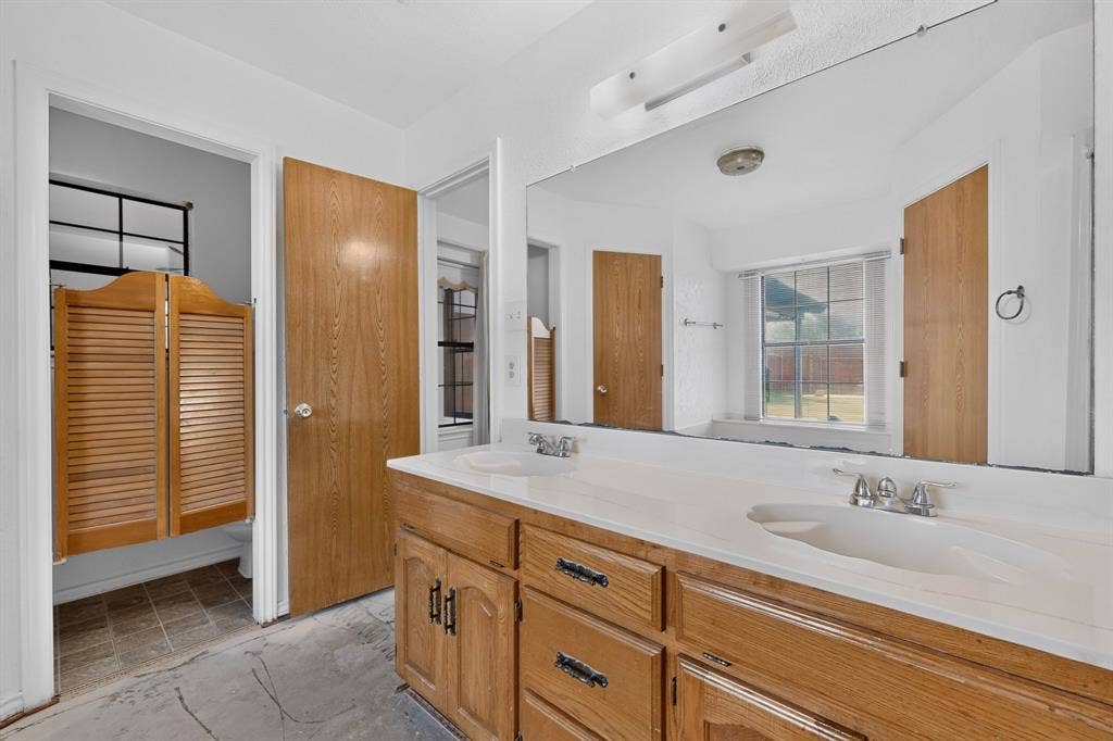 303 Stoneybrook Drive, Wylie, TX 75098 Double vanity with integrated sinks and chrome fixtures