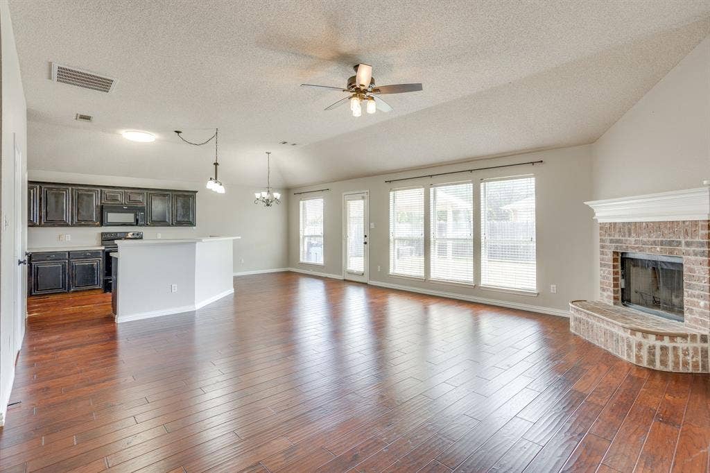 400 Bretts Way, Burleson, TX 76028 Open concept Living, kitchen, breakfast nook and Fireplace.