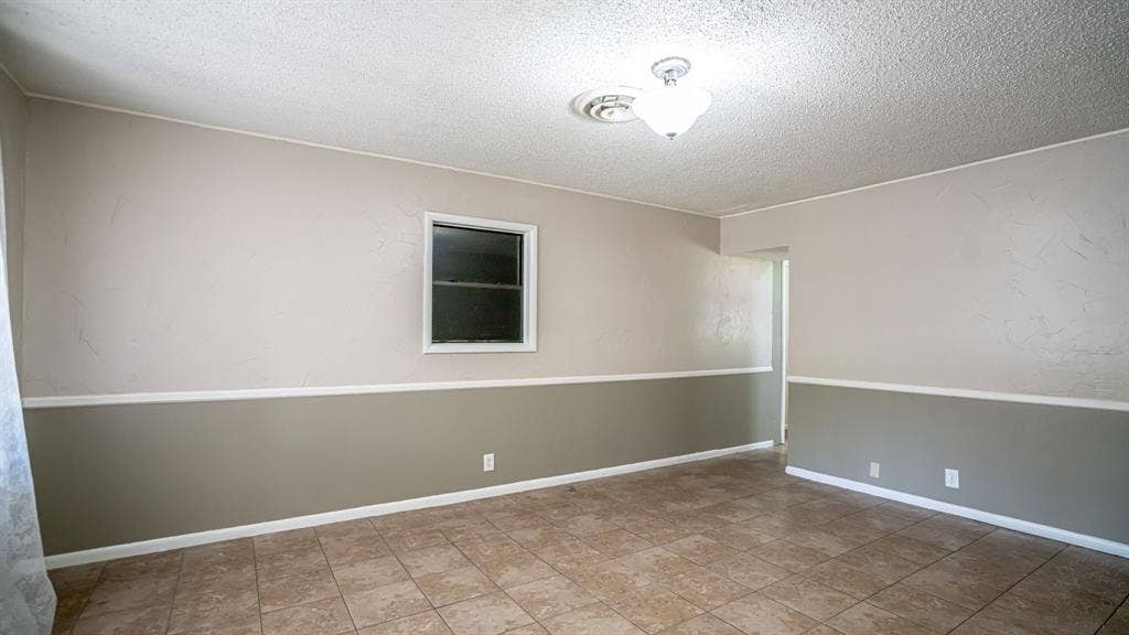 1110 Penrod Street, Granbury, TX 76048 Dining room with new tile flooring