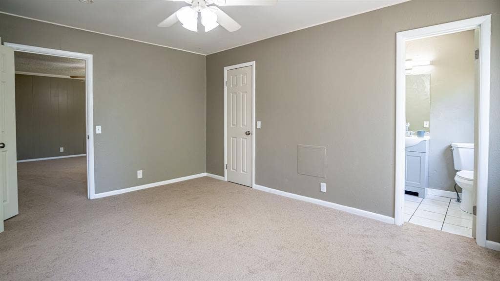 1110 Penrod Street, Granbury, TX 76048 Primary bedroom and bath